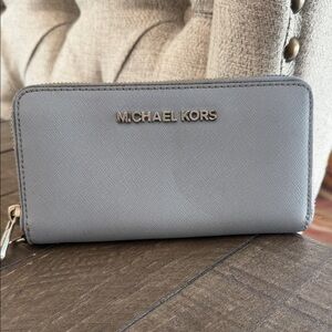 Michale Kors Light Blue Zip Around Wallet in Th e Saffarino Leather
